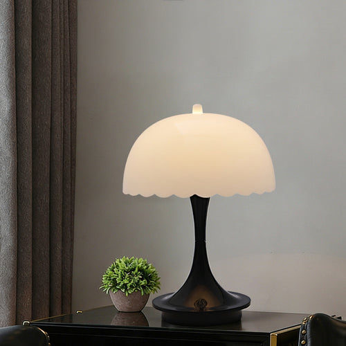 Modern mushroom-shaped table lamp with soft ambient LED lighting and touch controls.